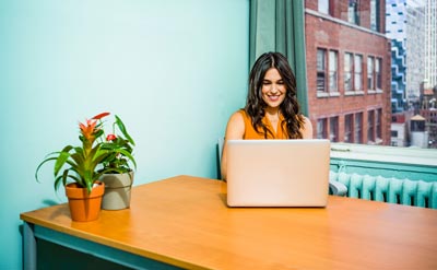 Woman using her laptop.